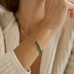 BAGUETTE EMERALD TENNIS BRACELET